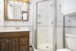 Full bathroom with a step in shower